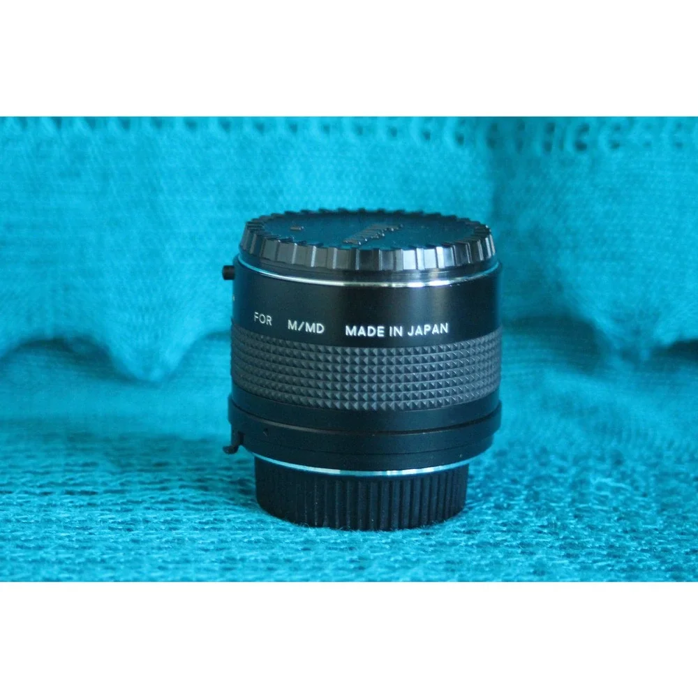 Vivitar 75-205 MM F1:3.8 Lens for Minolta MC mount with 2x converter.